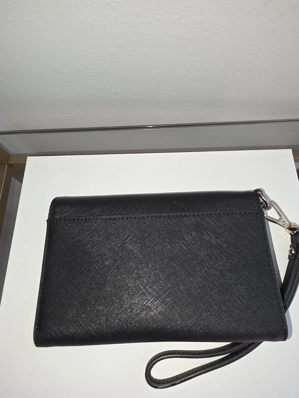 DKNY Black Leather Wristlet Clutch with Silver Logo Accent
